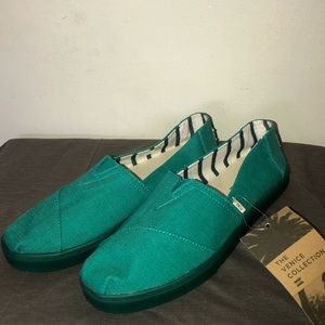 Solid green Toms shoes